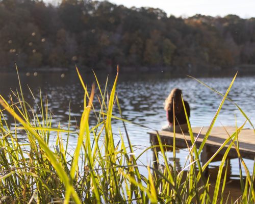 Brianna on dock at Saxapahaw Lake